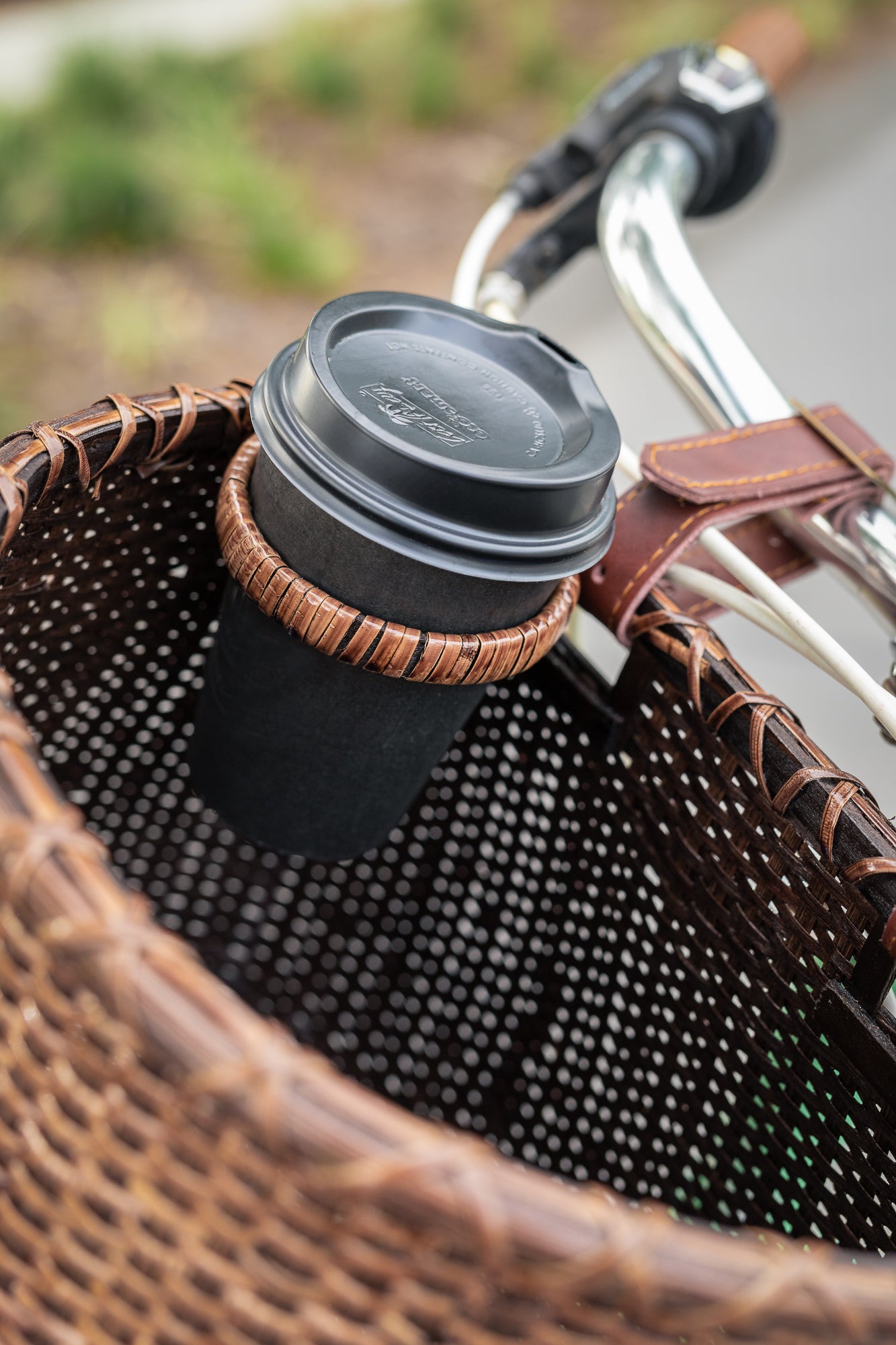 Close up photo of the bike baskets coffee cup holder